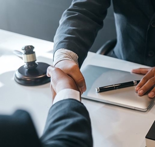 two people shaking hands