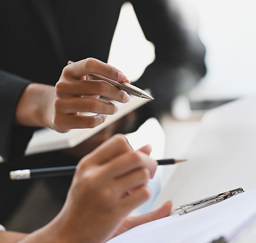 people reviewing papers